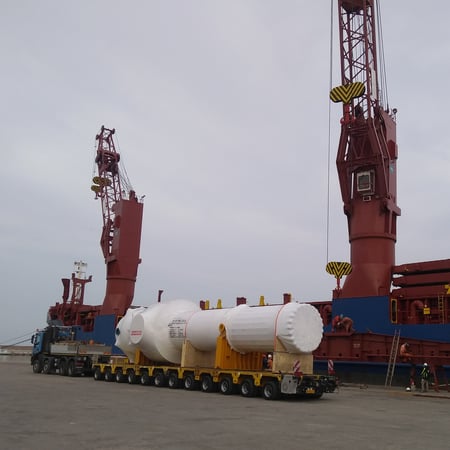 Tube bundle parked next to vessel in port